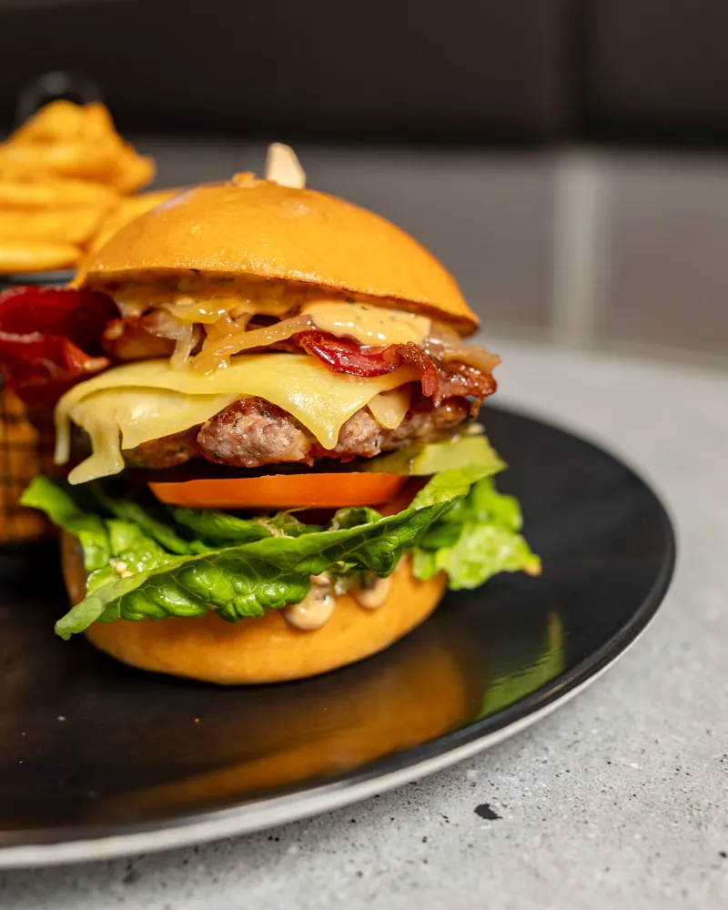 Wagyu beef burger with cheddar and glazed bacon
